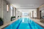 60 ft. indoor pool with access to an outdoor terrace overlooking Bennett Park.