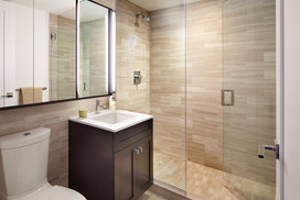 Custom bathrooms with oversized custom medicine cabinets.