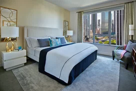 Expansive windows open to sweeping views of Downtown LA and beyond.