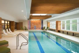 A heated swimming pool flooded with natural light, adjacent to a state-of-the-art health and fitness center, will inspire you to meet your fitness goals.