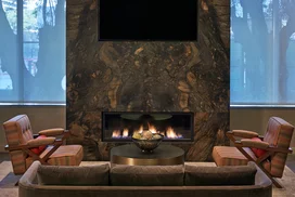 The technology lounge includes a fireplace.