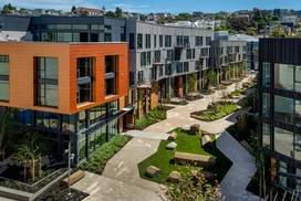 Landscaped courtyards with outdoor grills and dining