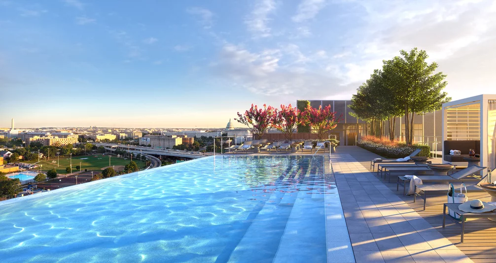 The gravity-defying rooftop infinity pool and hot tub offer unobstructed panoramic views of the District.