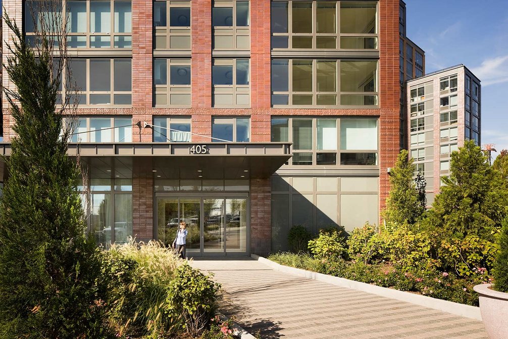 The landscaping at the front entrance of Riverwalk Crossing welcomes residents home.