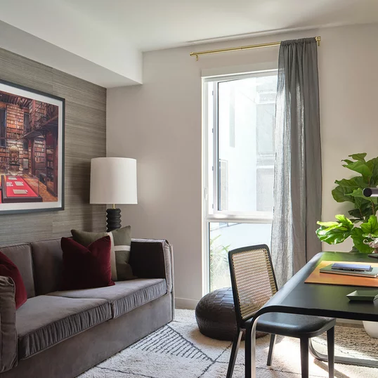 Expansive windows bring in natural light and black out shades are provided in each bedroom.